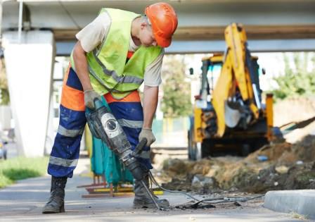 road construction workers working