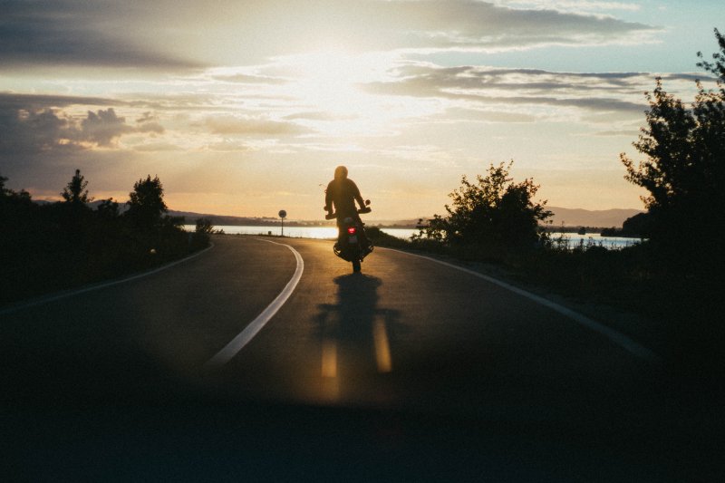 motorcycle-highway-sunset