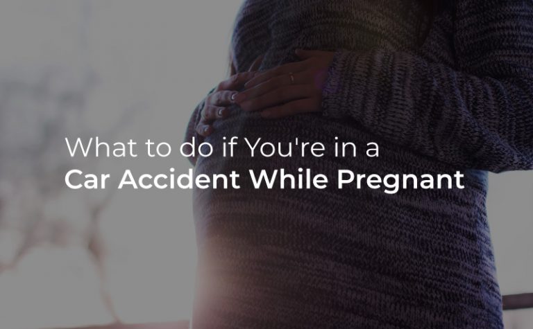 pregnant person in background, what to do if you're in a car accident while pregnant