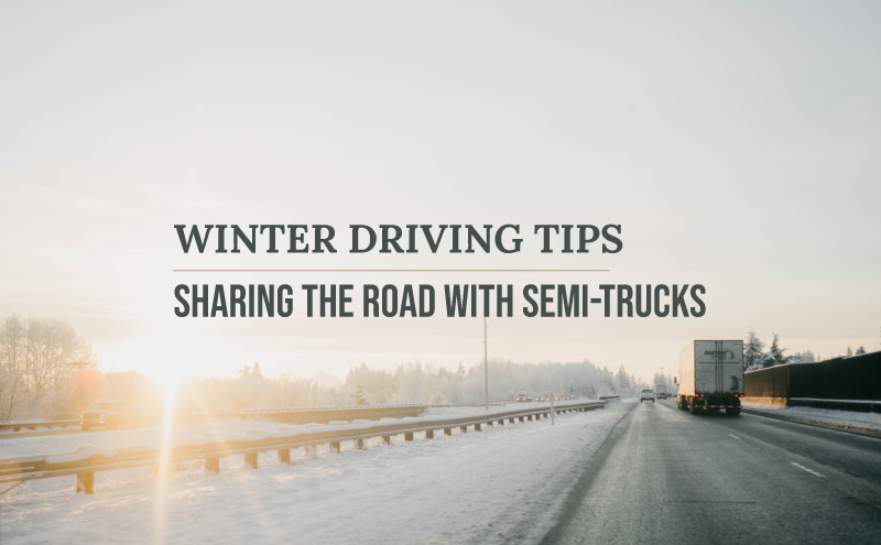semi-truck driving on winter road