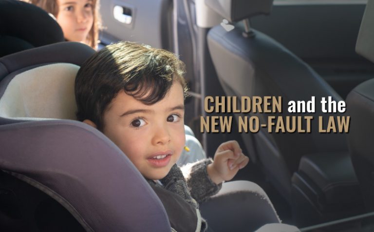 child in car seat, words overlaid say "children and the new no-fault law"