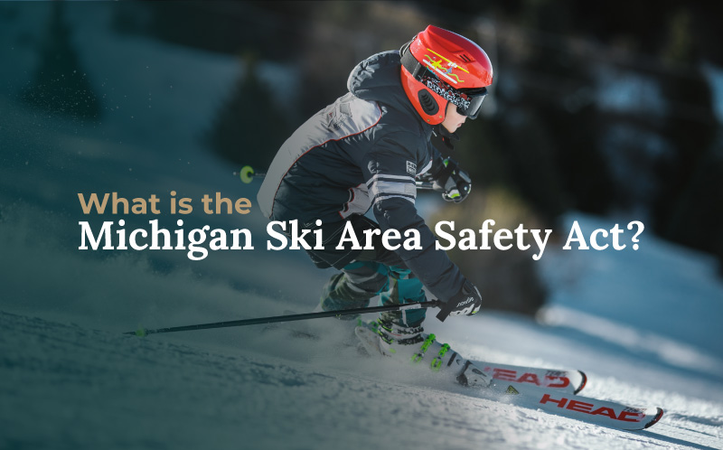 young skier skiing down snowy hill