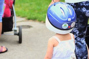 Child wearing helmet at Grand Rapids Lids for Kids