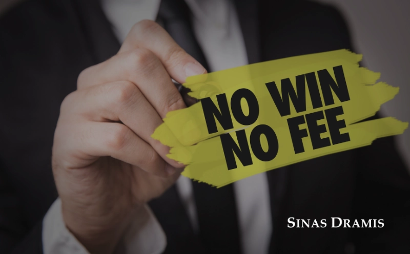 Attorney holding a sign displaying the phrase “No Win No Fee,” representing contingency fee agreements in personal injury cases.