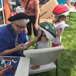 Lansing bike helmet giveaway face painting 