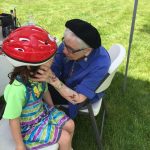 Lansing bike helmet giveaway face painting 3